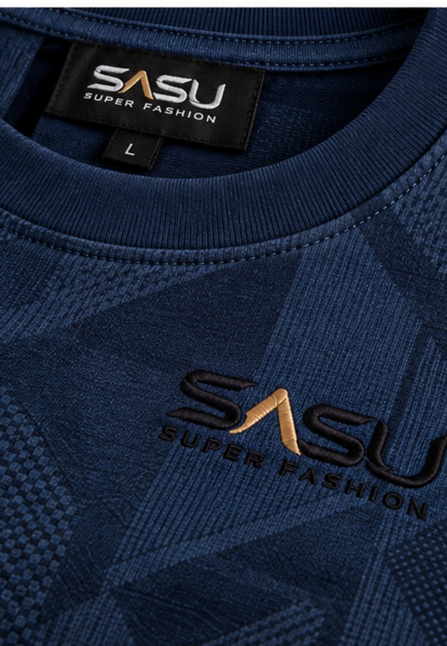 Close-up of the tonal geometric jacquard knit on a navy T-shirt