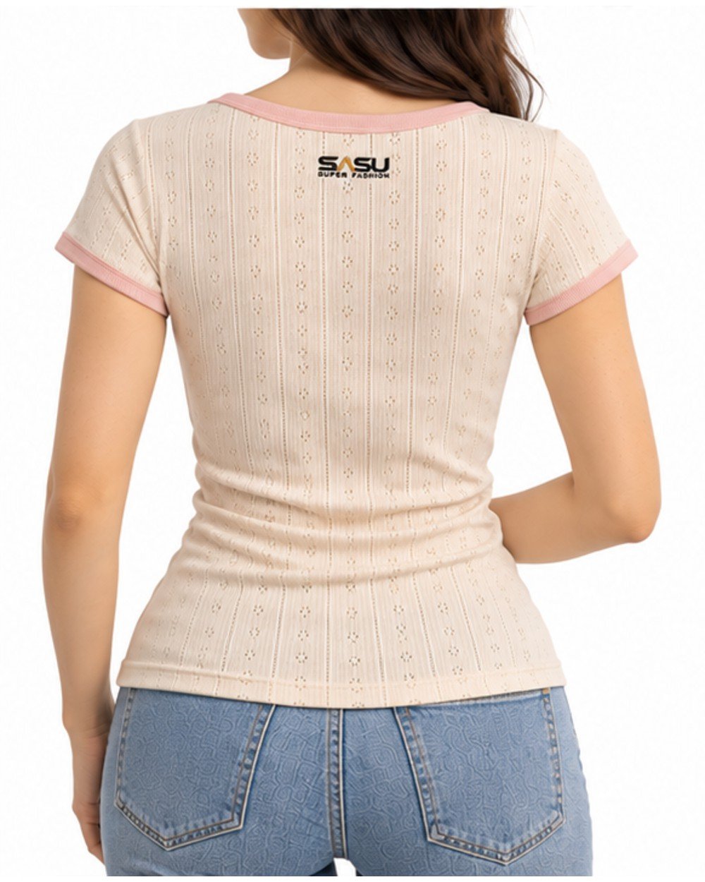 Woman wearing the cream pointelle top with blue jeans, back view
